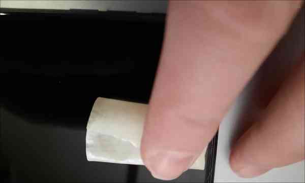 Masking-or-Painters-Tape-Clean-iPhone-Speakers Masking-or-Painters-Tape-Clean-iPhone-Speakers